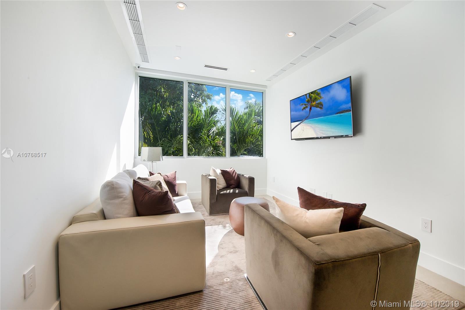 4080 Ensenada Avenue Miami, FL 33133 - Photo 8 of 20 a living room with furniture and a large window