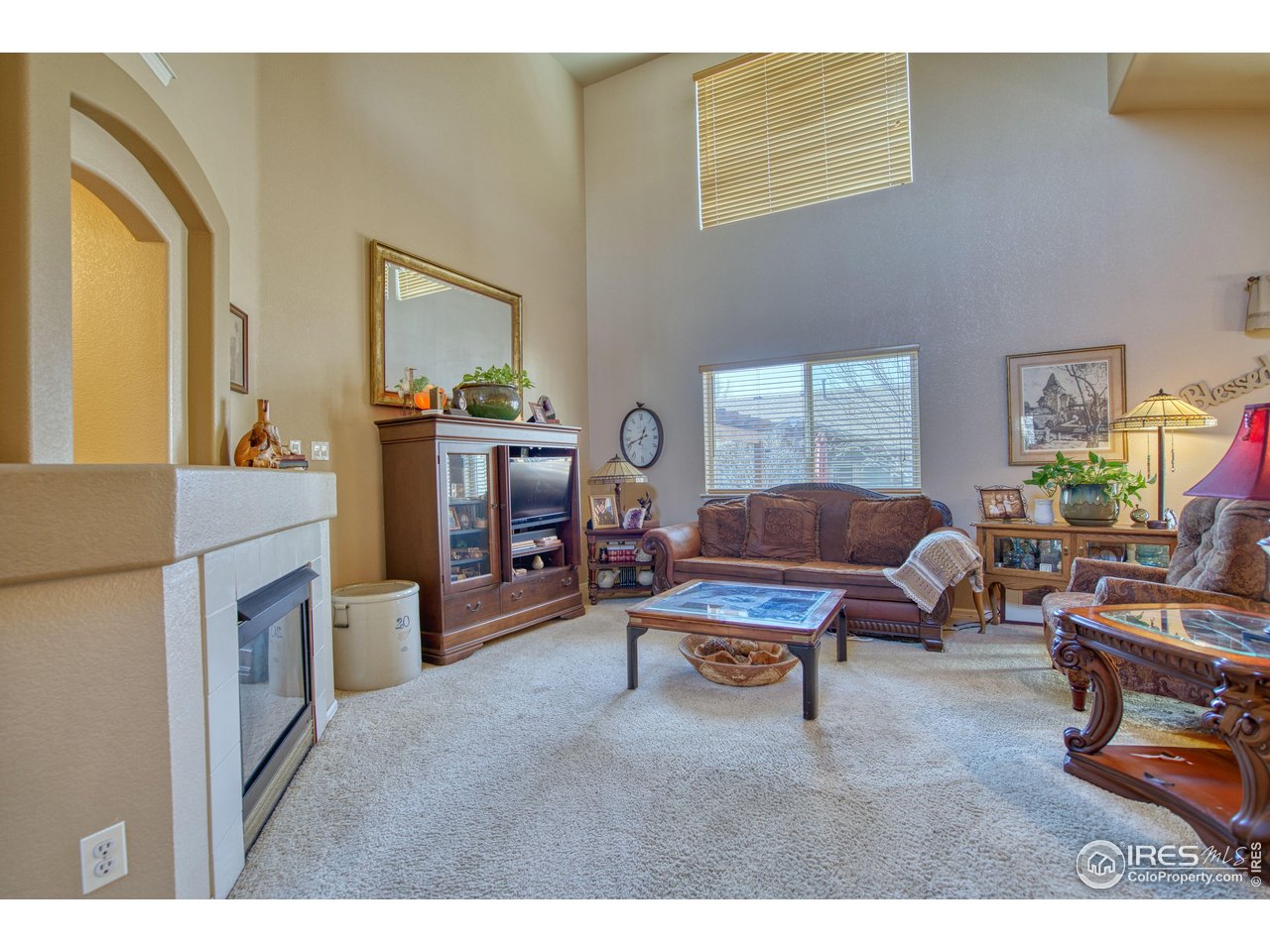 6727 Thistle Ridge Avenue Firestone, CO 80504 - Photo 14 of 40 a living room with furniture and a window