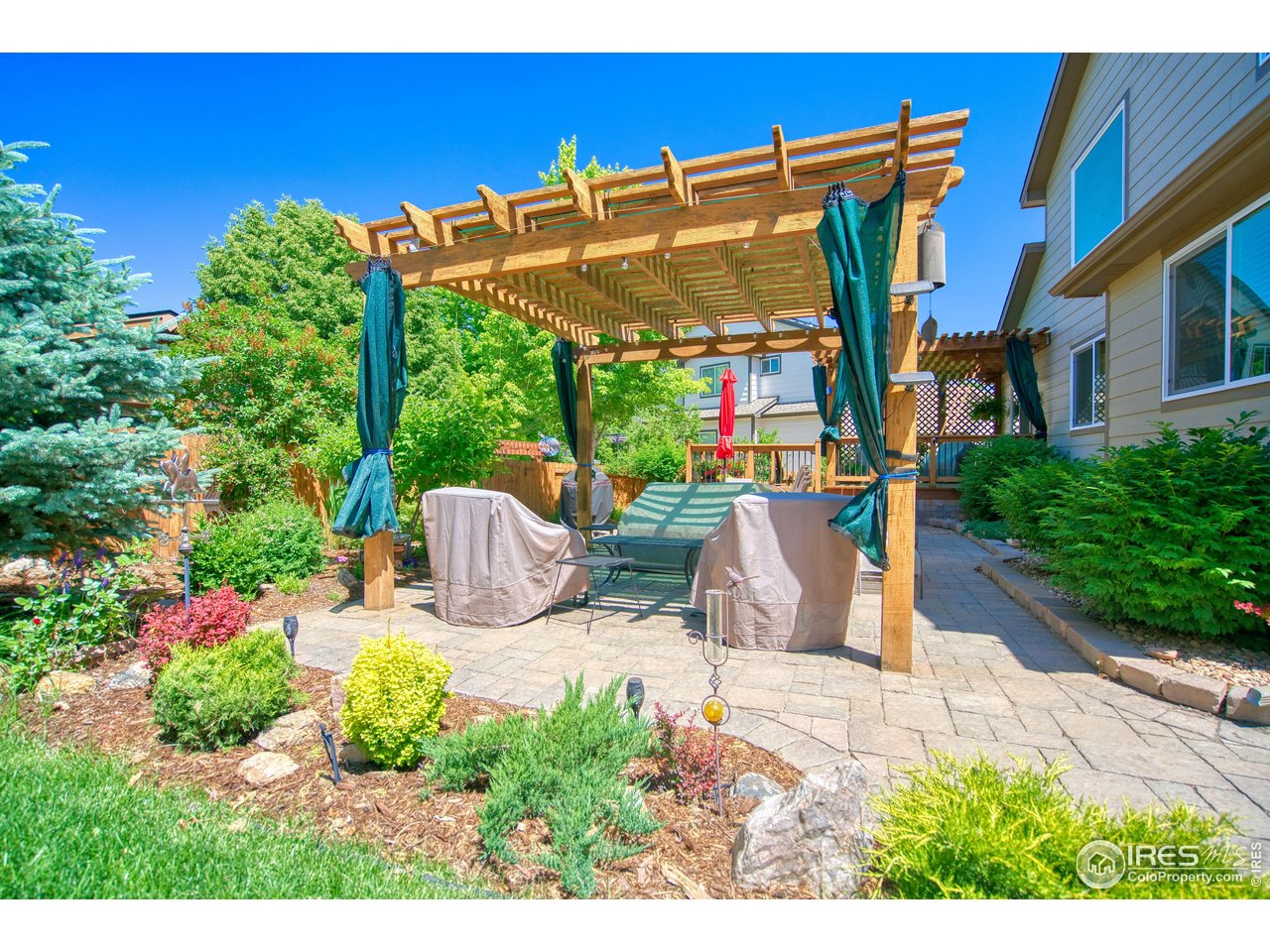 6727 Thistle Ridge Avenue Firestone, CO 80504 - Photo 35 of 40 a view of outdoor space yard and patio