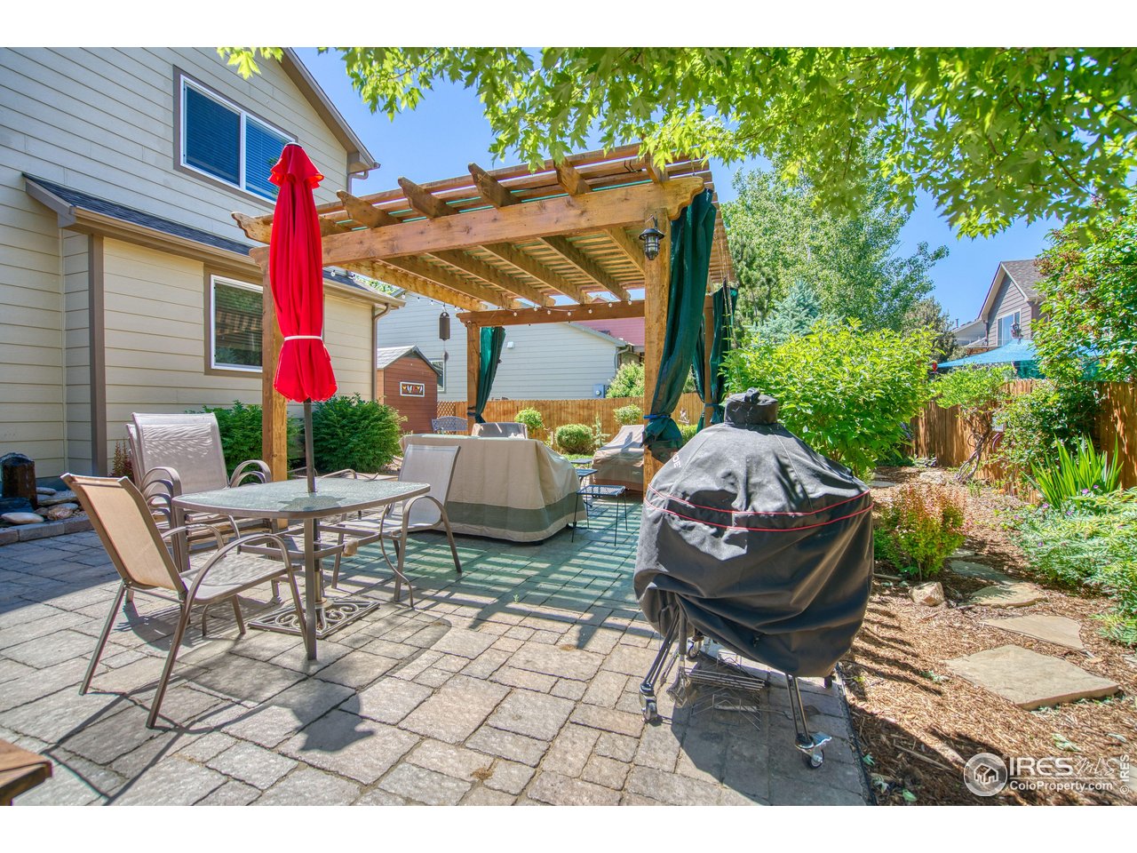 6727 Thistle Ridge Avenue Firestone, CO 80504 - Photo 36 of 40 a view of outdoor space yard and patio