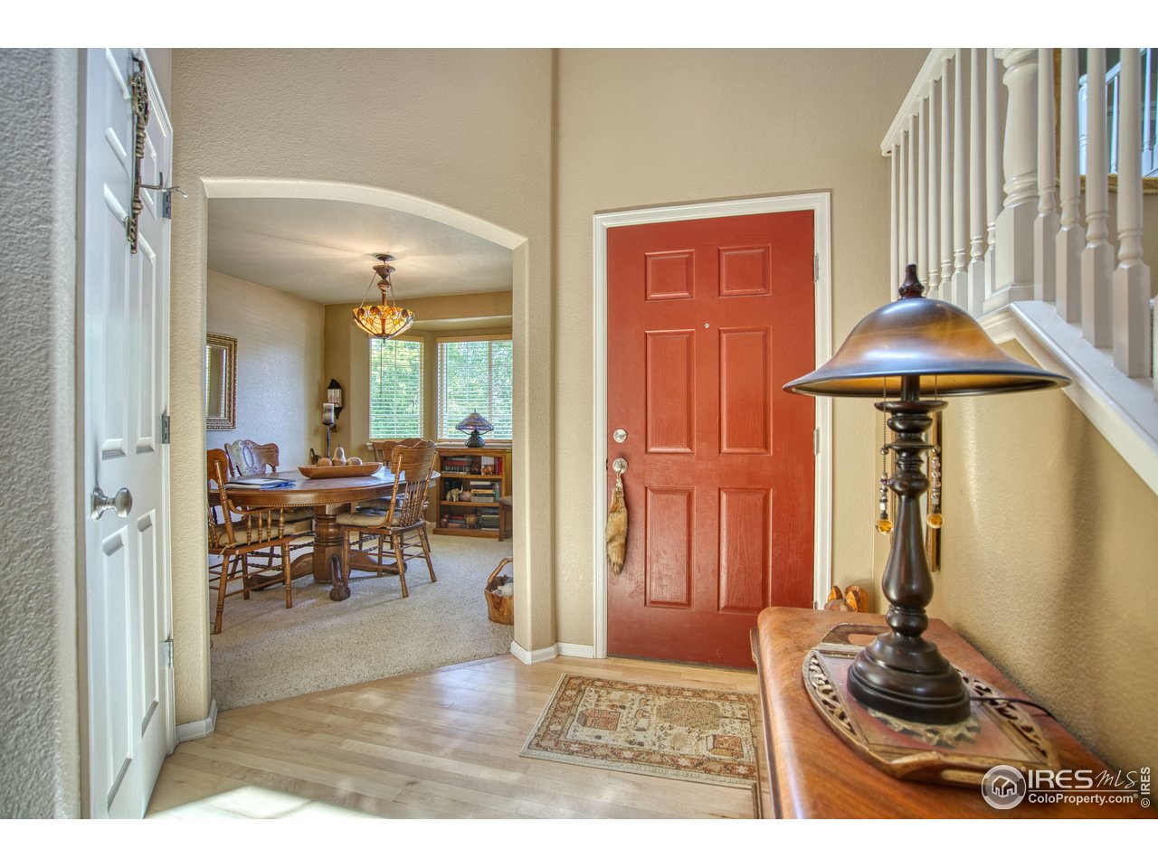 6727 Thistle Ridge Avenue Firestone, CO 80504 - Photo 4 of 40 a view of a livingroom with furniture and window