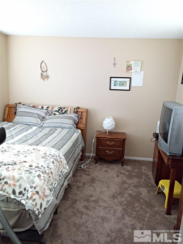 3422 Bowie Road Reno, NV 89503 - Photo 7 of 13 a bedroom with bed and a window