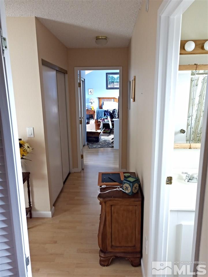 3422 Bowie Road Reno, NV 89503 - Photo 10 of 13 a view of hallway with livingroom and furniture