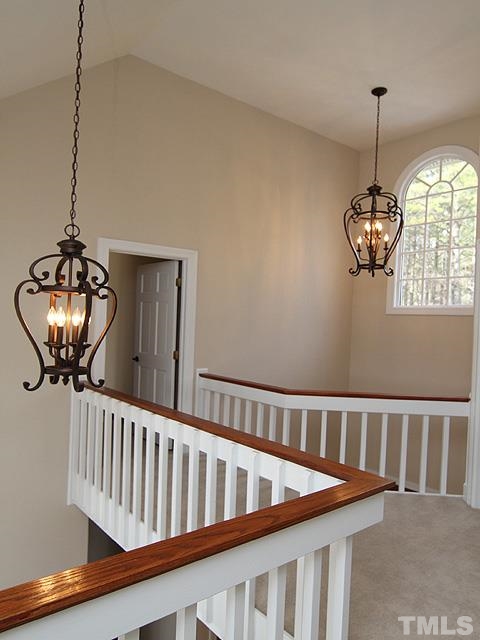 8036 Hawkshead Road Wake Forest, NC 27587 - Photo 23 of 25 View of the 2nd floor hall leading to Bonus Room. Overlooks the Entrance Hall and Stairwell with beautiful windows and sunlight.