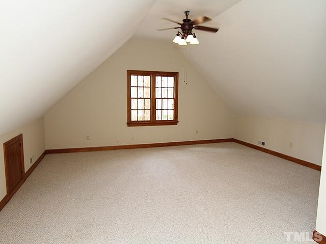 8036 Hawkshead Road Wake Forest, NC 27587 - Photo 24 of 25 This Bonus Room is large enough for multi-purposes and has an attached, renovated 1/2 Bath. The huge L-shaped space would work well as a Den, Game Room, Office, Theatre Room, etc.