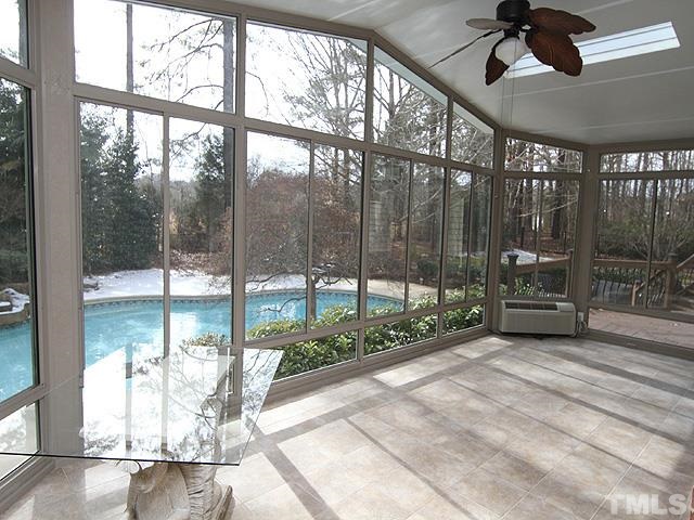 8036 Hawkshead Road Wake Forest, NC 27587 - Photo 25 of 25 This Sun Porch overlooks the pool and professional landscape design and plantings. A fireplace, walls of glass, and an independent HVAC unit allow enjoyment all year long.