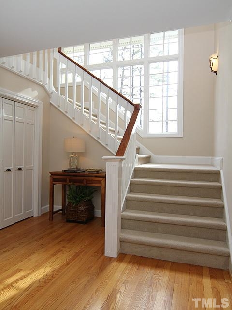 8036 Hawkshead Road Wake Forest, NC 27587 - Photo 7 of 25 This 2-story Entrance Hall is welcoming with hardwood floors and plenty of sunlight. Immediately to your right is the Library/Study/Music Room, and the Dining Room is on the left.