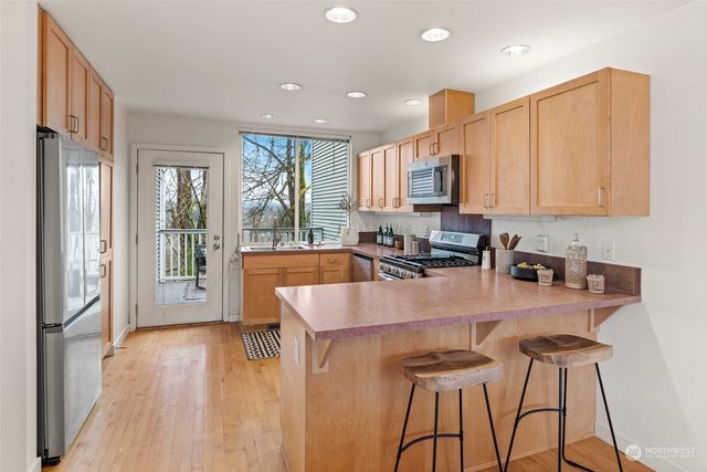 a bathroom with a sink and a window
