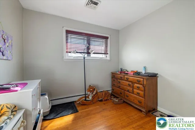 a kitchen with cabinets appliances a sink and a window