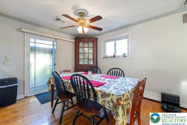 a view of outdoor space with wooden floor and outdoor seating