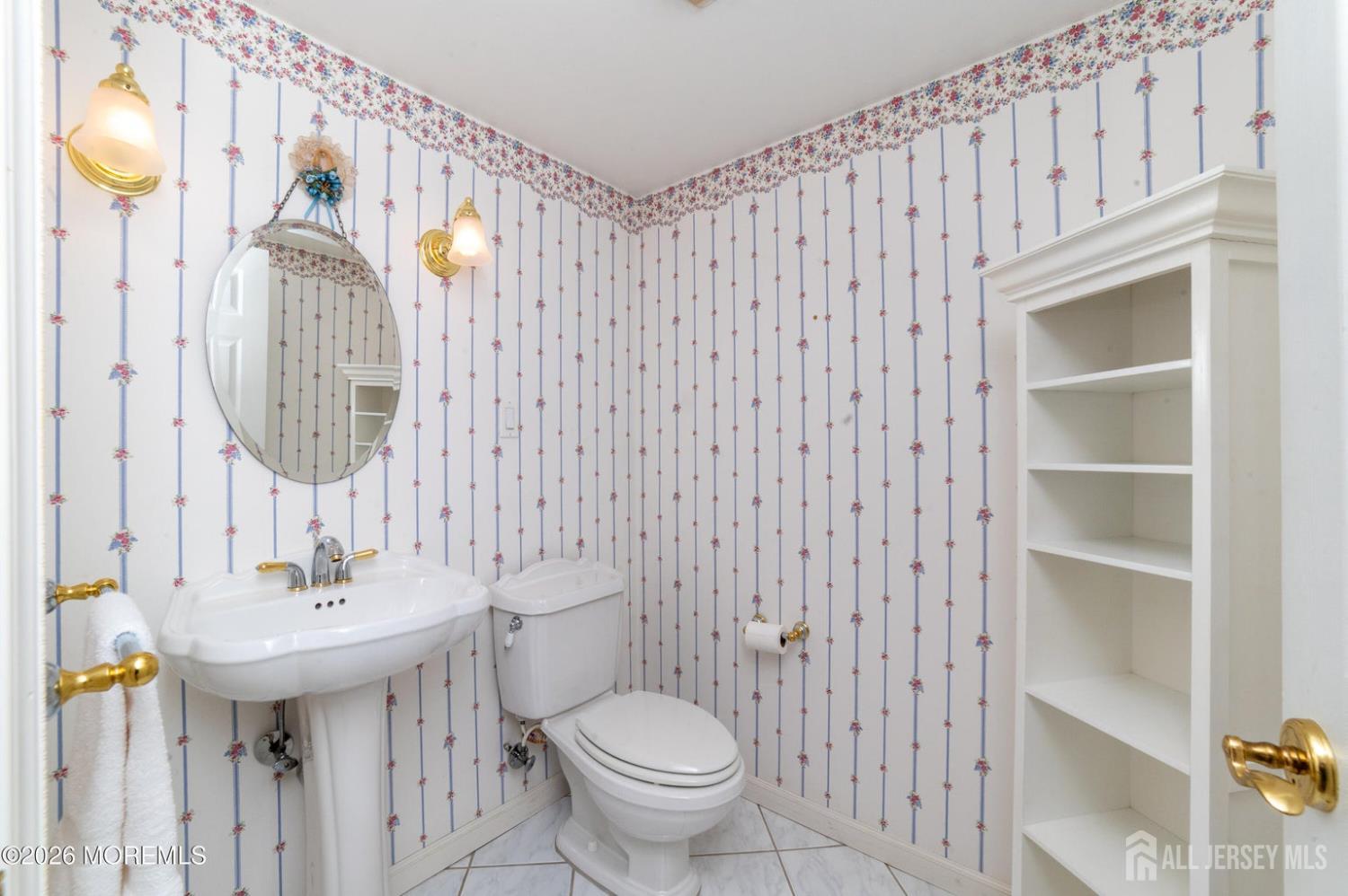 2 Brentwood Road Old Bridge, NJ 07747 - Photo 21 of 30 a bathroom with a sink a toilet and a mirror