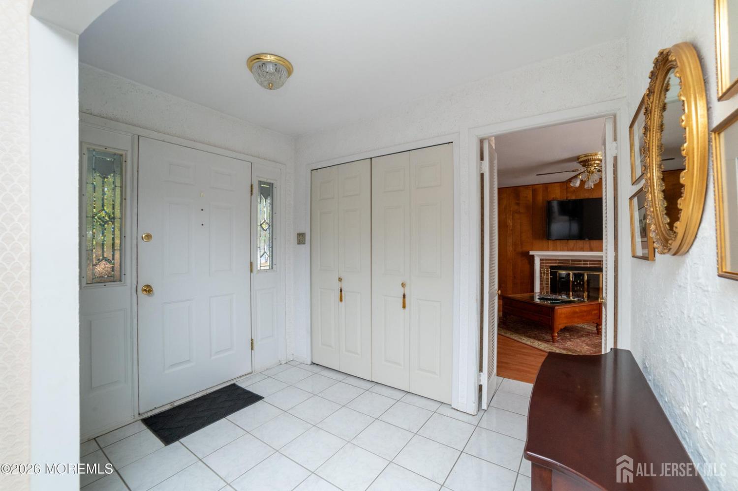 2 Brentwood Road Old Bridge, NJ 07747 - Photo 5 of 30 a view of a hallway with wooden shelves