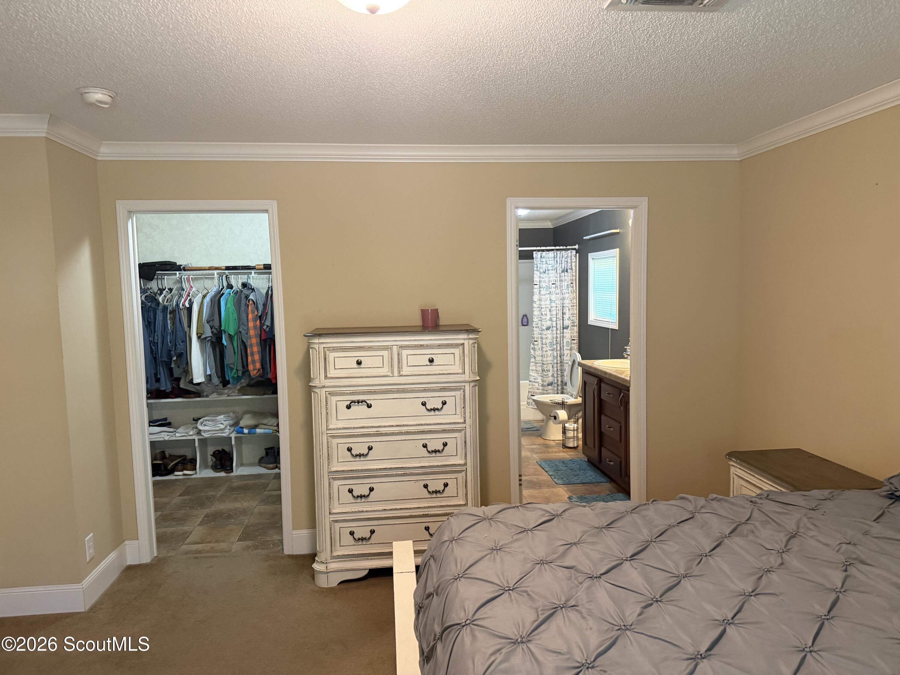 1214 Azalea Road Northeast Townsend, GA 31331 - Photo 17 of 24 Master closet and bath