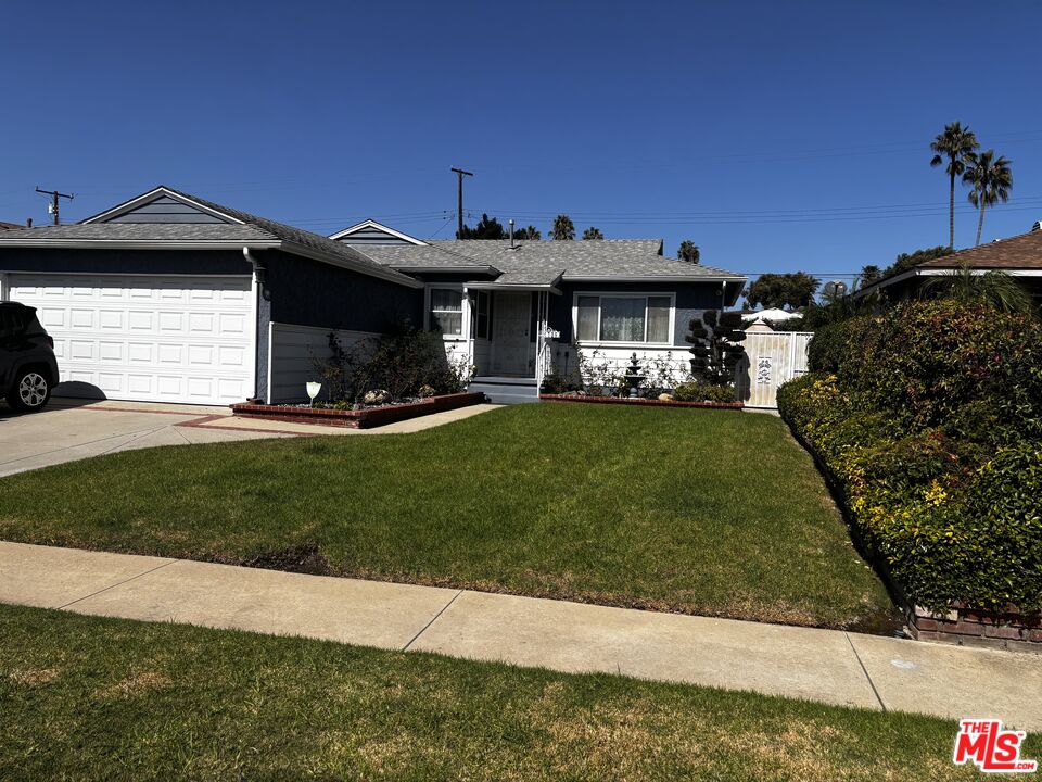729 East 154th Street Compton, CA 90220 - Photo 1 of 10 a view of a house with a yard and sitting area