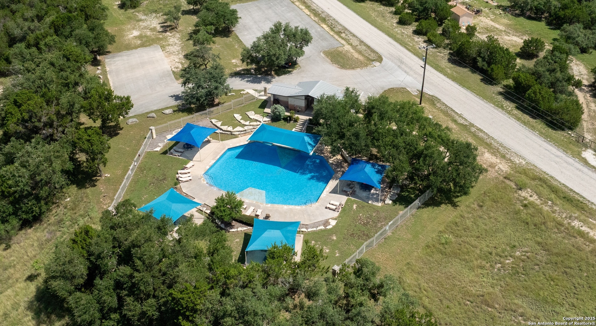 436 Arthur Court Spring Branch, TX 78070 - Photo 2 of 6 an aerial view of a house with a yard and lake view