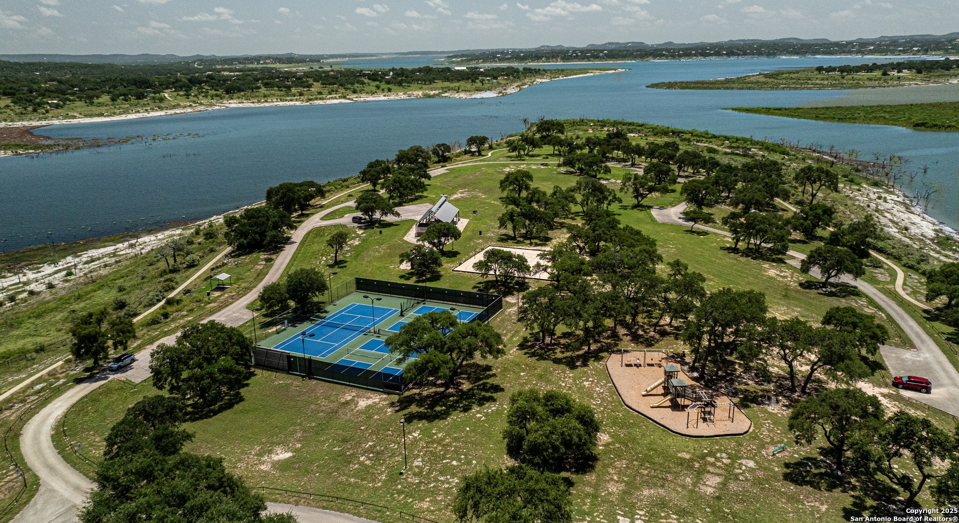 436 Arthur Court Spring Branch, TX 78070 - Photo 3 of 6 a view of a lake with a mountain