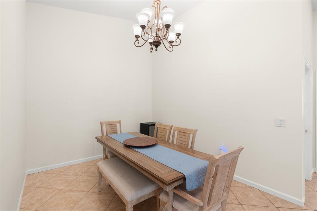 9106 Southwest 22nd Street, Unit D Boca Raton, FL 33428 - Photo 15 of 41 a view of a dining area in a room