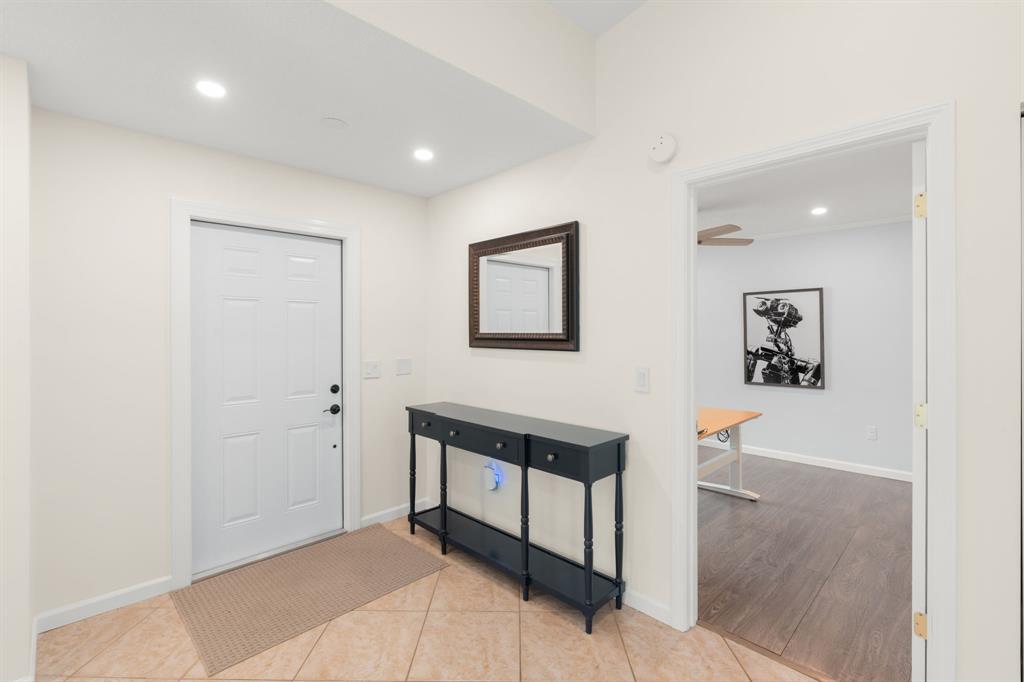 9106 Southwest 22nd Street, Unit D Boca Raton, FL 33428 - Photo 22 of 41 a view of a hallway with front door