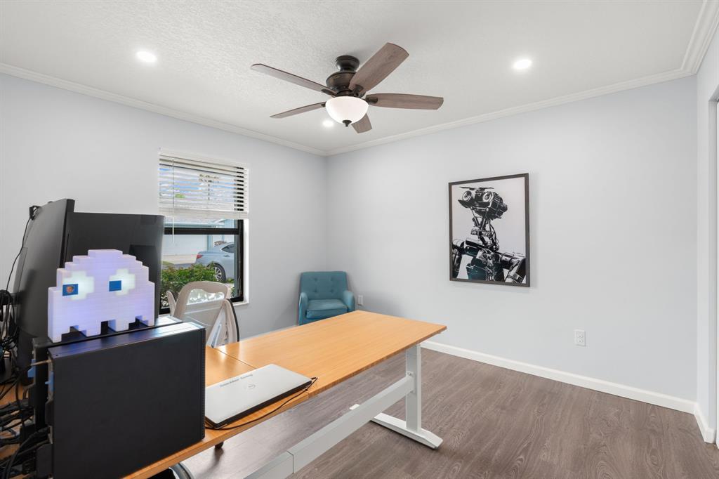 9106 Southwest 22nd Street, Unit D Boca Raton, FL 33428 - Photo 23 of 41 a workspace with furniture and window