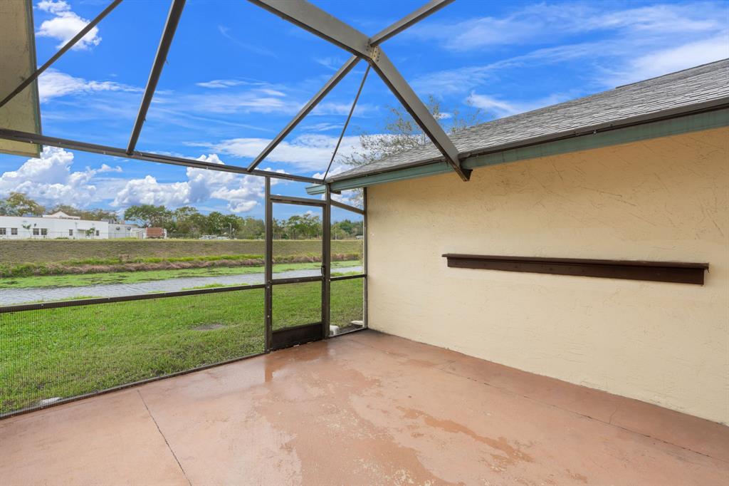 9106 Southwest 22nd Street, Unit D Boca Raton, FL 33428 - Photo 28 of 41 a view of a backyard