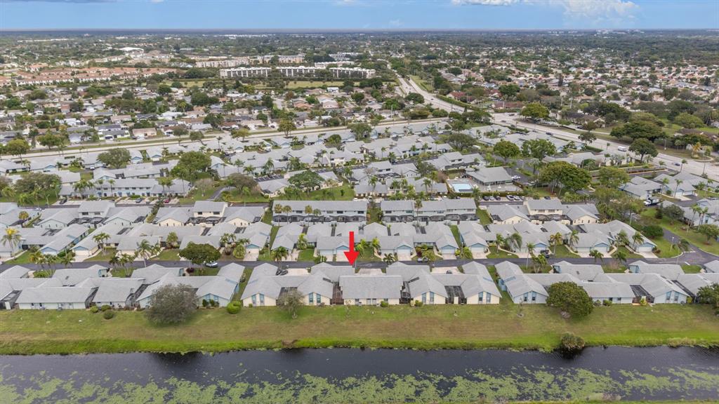 9106 Southwest 22nd Street, Unit D Boca Raton, FL 33428 - Photo 34 of 41 an aerial view of residential houses with outdoor space
