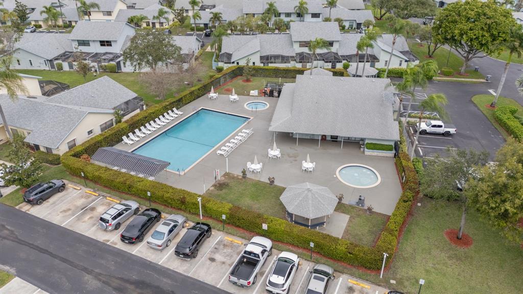 9106 Southwest 22nd Street, Unit D Boca Raton, FL 33428 - Photo 37 of 41 an aerial view of a house with swimming pool