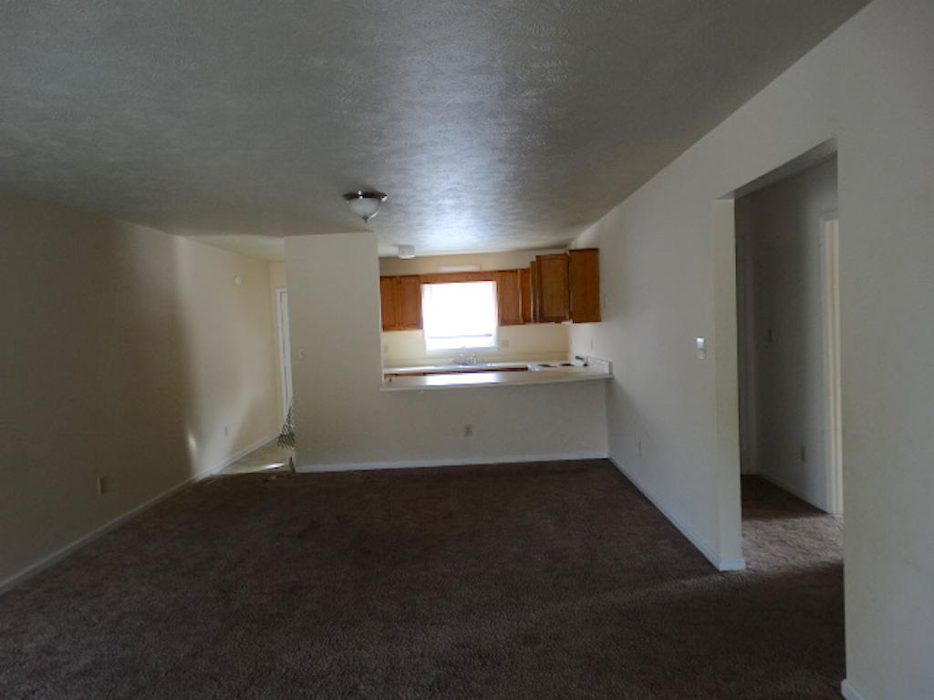 21780 Old Wire Road Wagram, NC 28396 - Photo 7 of 17 Living room to Kitchen view
