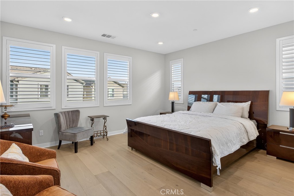 382 Chorus Irvine, CA 92618 - Photo 14 of 38 a bedroom with a bed and a couch