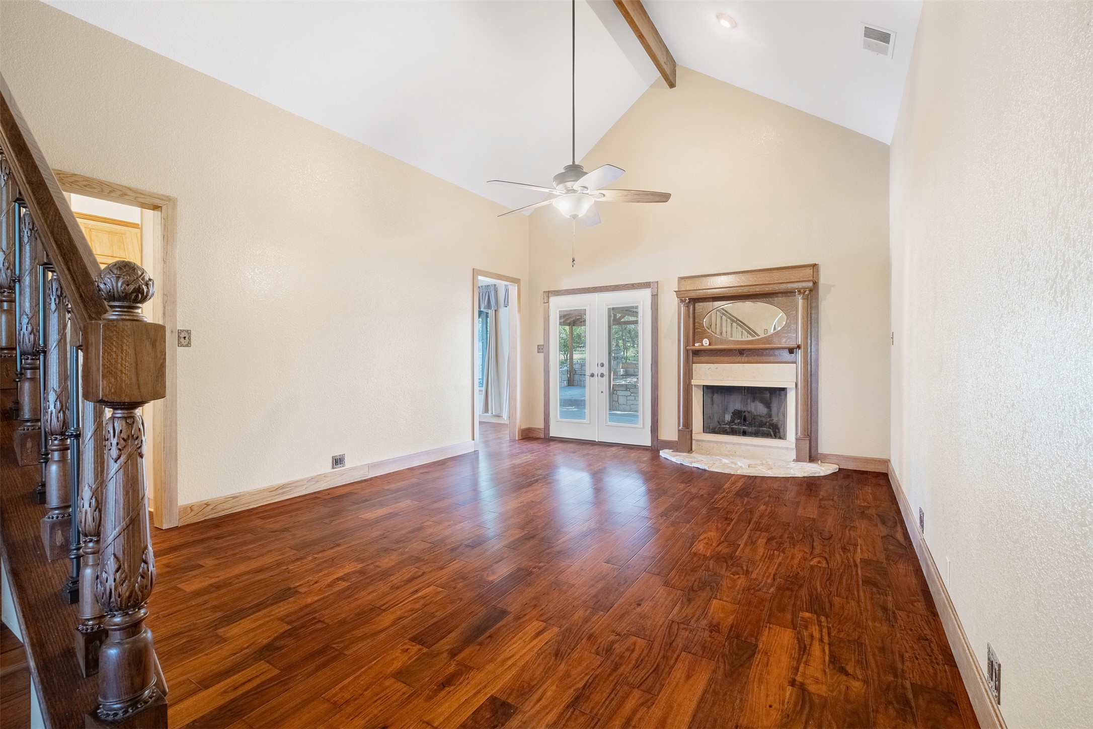360 Sunset Ridge Drive Liberty Hill, TX 78642 - Photo 18 of 40 a view of an empty room with a window and wooden floor