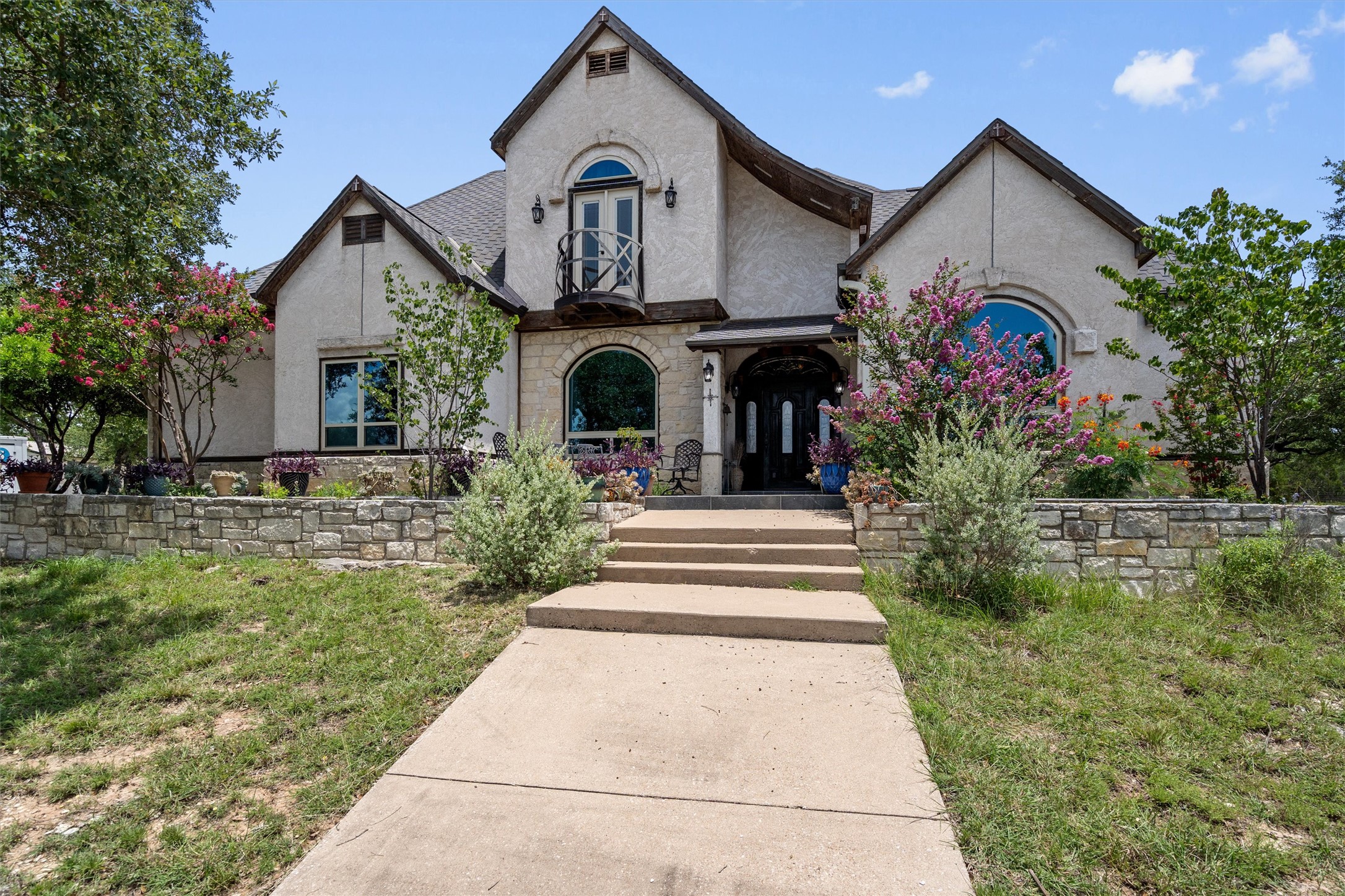 360 Sunset Ridge Drive Liberty Hill, TX 78642 - Photo 2 of 40 a front view of house with yard and green space