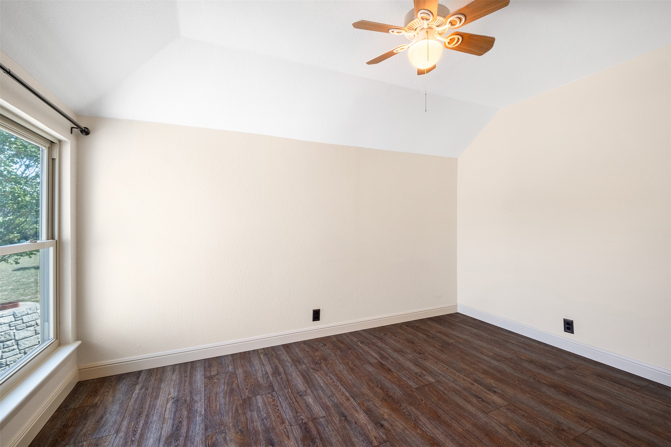 360 Sunset Ridge Drive Liberty Hill, TX 78642 - Photo 29 of 40 a view of a room with wooden floor and fan