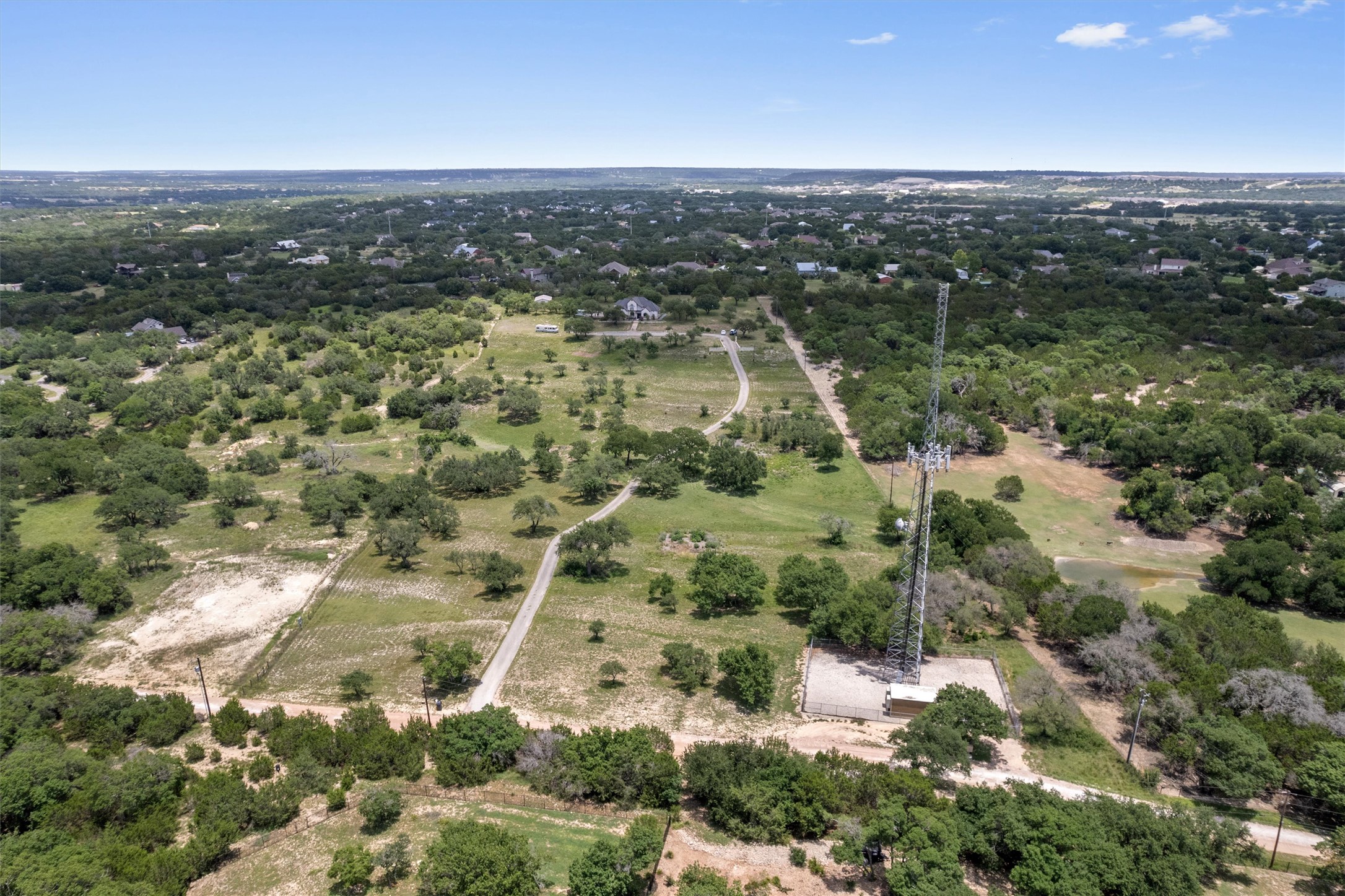 360 Sunset Ridge Drive Liberty Hill, TX 78642 - Photo 3 of 40 an aerial view of residential houses with outdoor space and trees