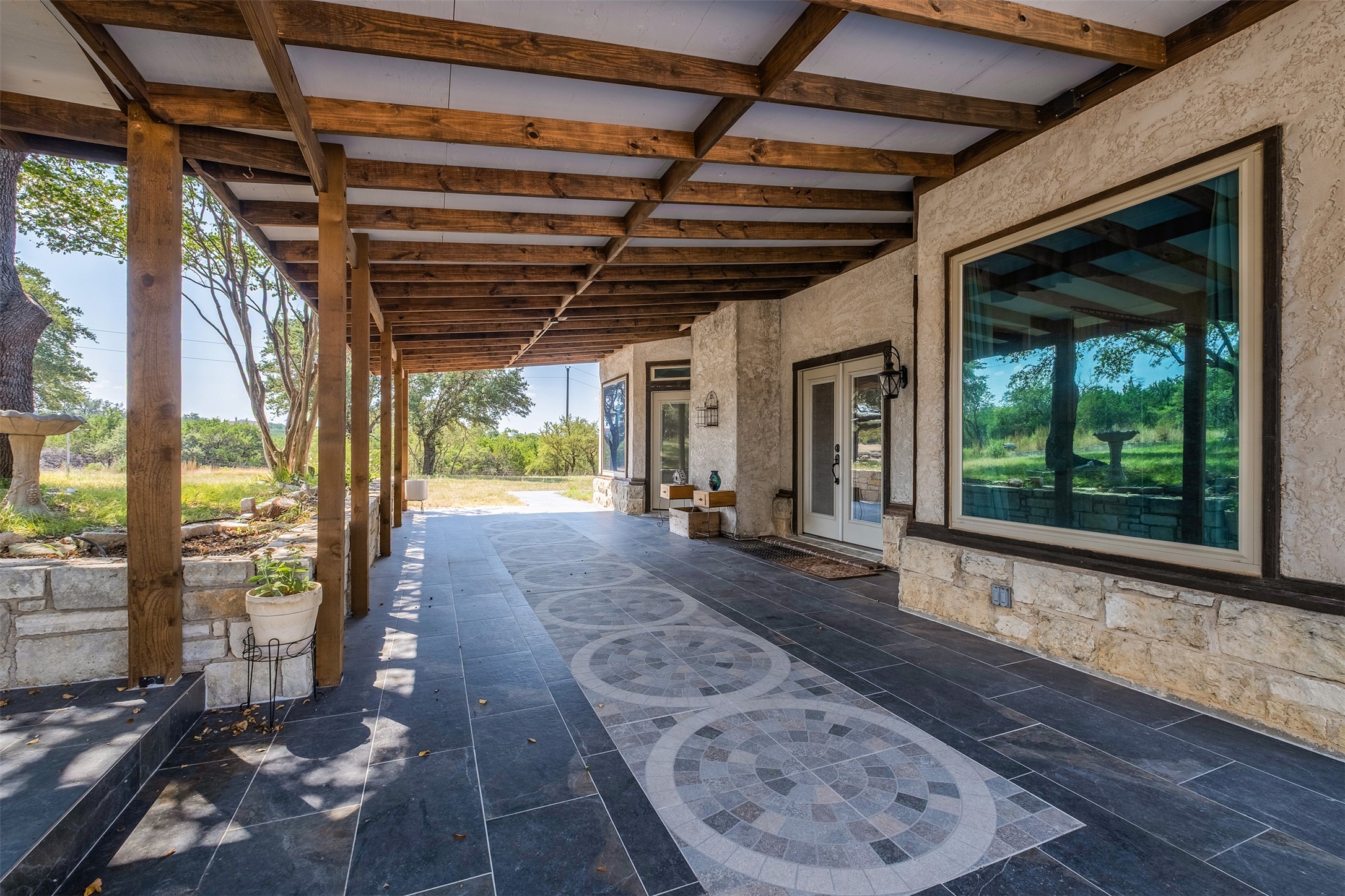 360 Sunset Ridge Drive Liberty Hill, TX 78642 - Photo 32 of 40 a view of a porch with wooden floor