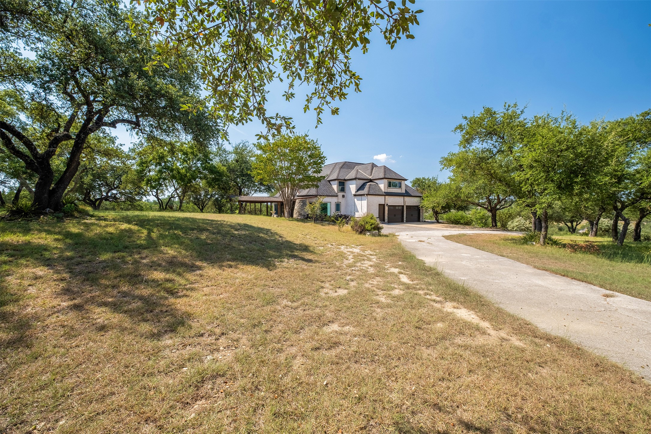 360 Sunset Ridge Drive Liberty Hill, TX 78642 - Photo 35 of 40 a view of a house with a yard