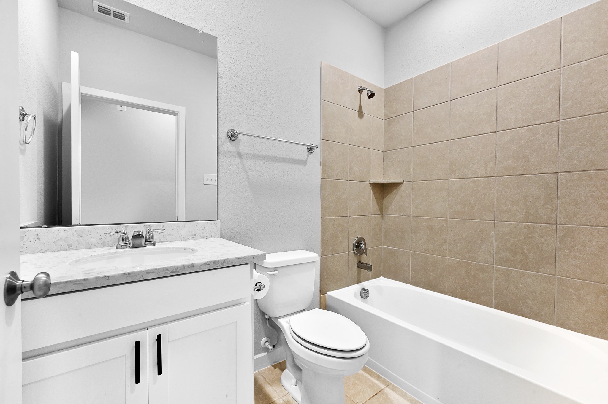 9119 Brixham Drive Cypress, TX 77433 - Photo 13 of 23 a bathroom with a sink toilet and shower