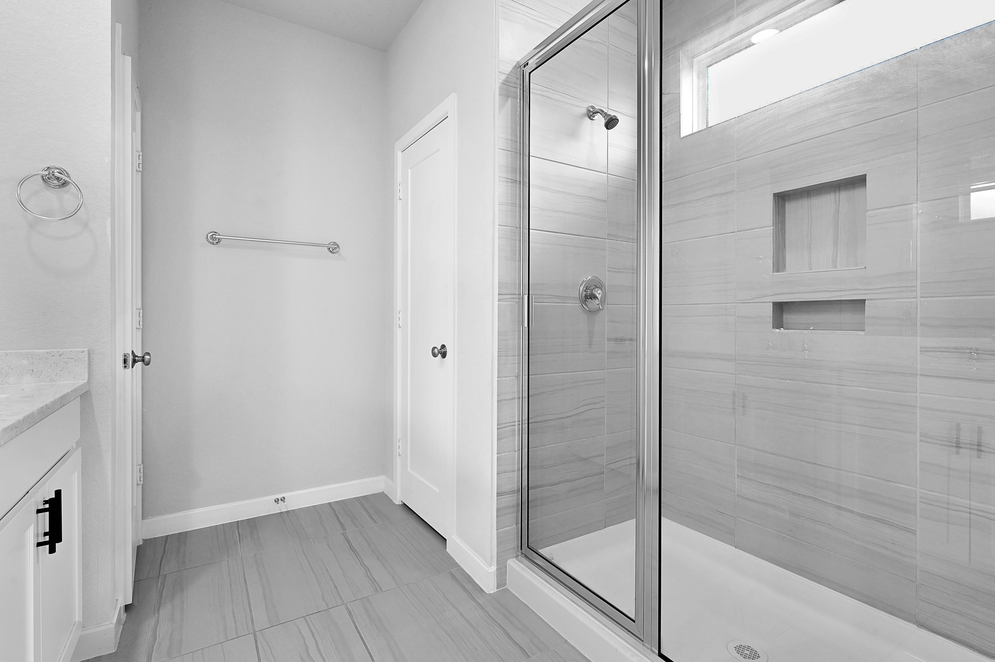 9119 Brixham Drive Cypress, TX 77433 - Photo 18 of 23 a bathroom with a bathtub and shower