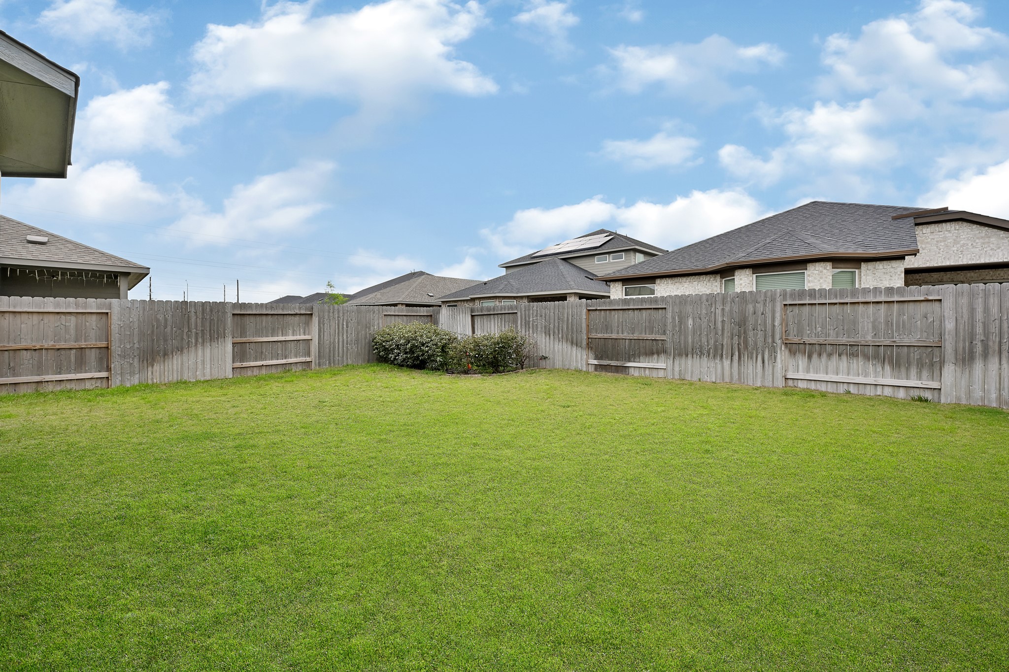 9119 Brixham Drive Cypress, TX 77433 - Photo 21 of 23 a view of a backyard with a garden and stairs