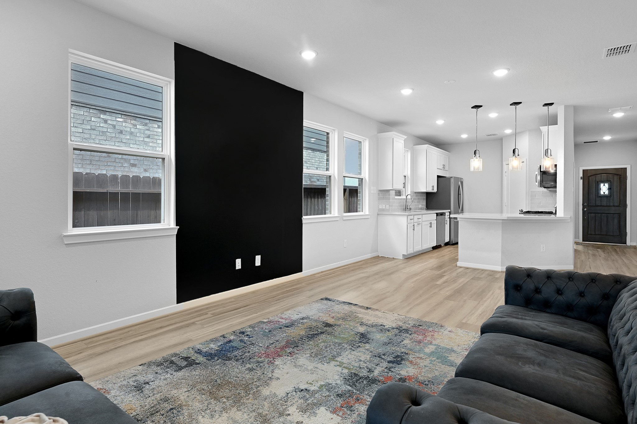 9119 Brixham Drive Cypress, TX 77433 - Photo 6 of 23 a living room with furniture and a large window