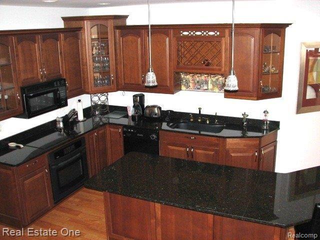 7774 Woodview Road Clarkston, MI 48348 - Photo 12 of 21 12 Lower Level Kitchen