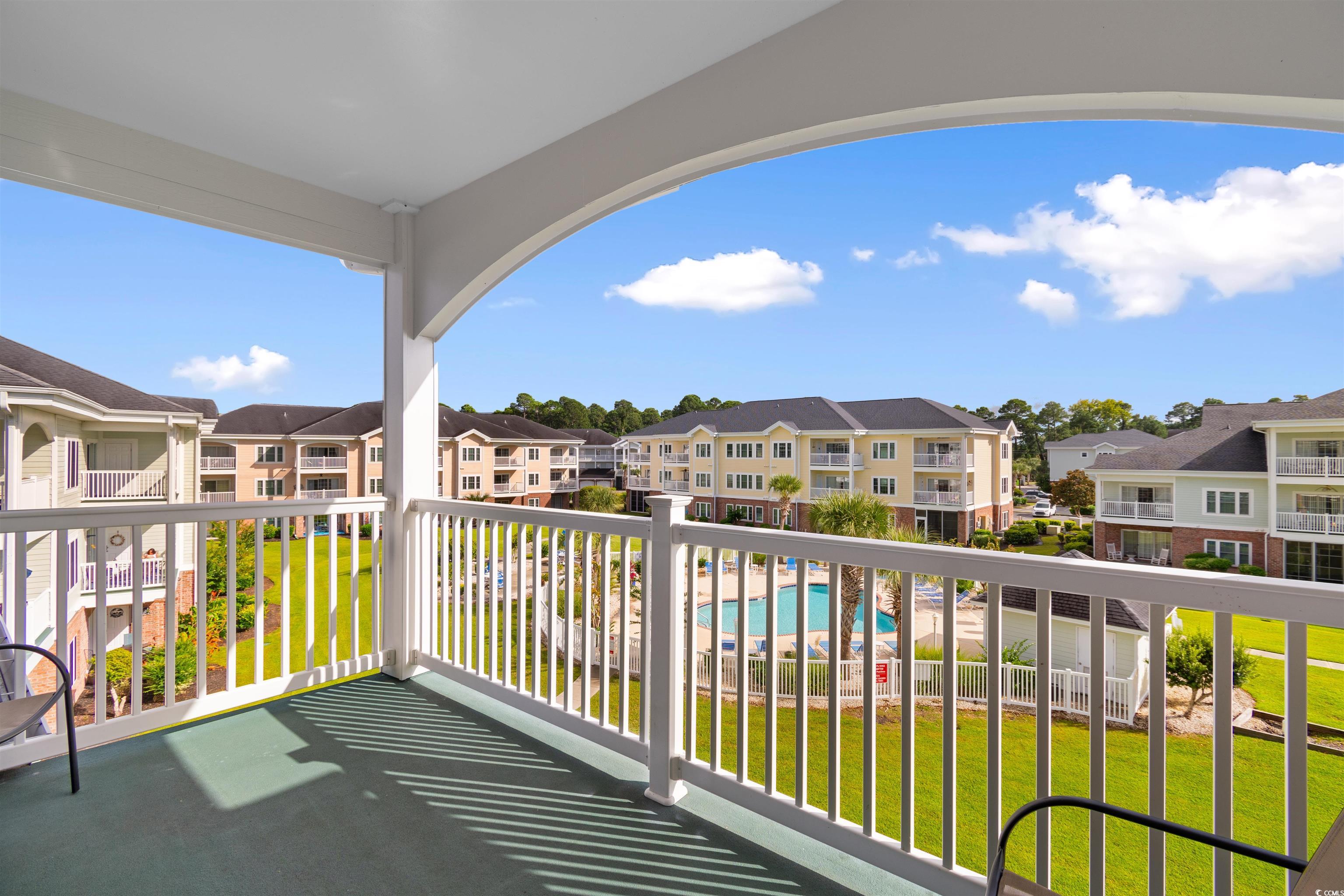 4856 Carnation Circle, Unit 302 Myrtle Beach, SC 29577 - Photo 11 of 28 Balcony featuring view of pool