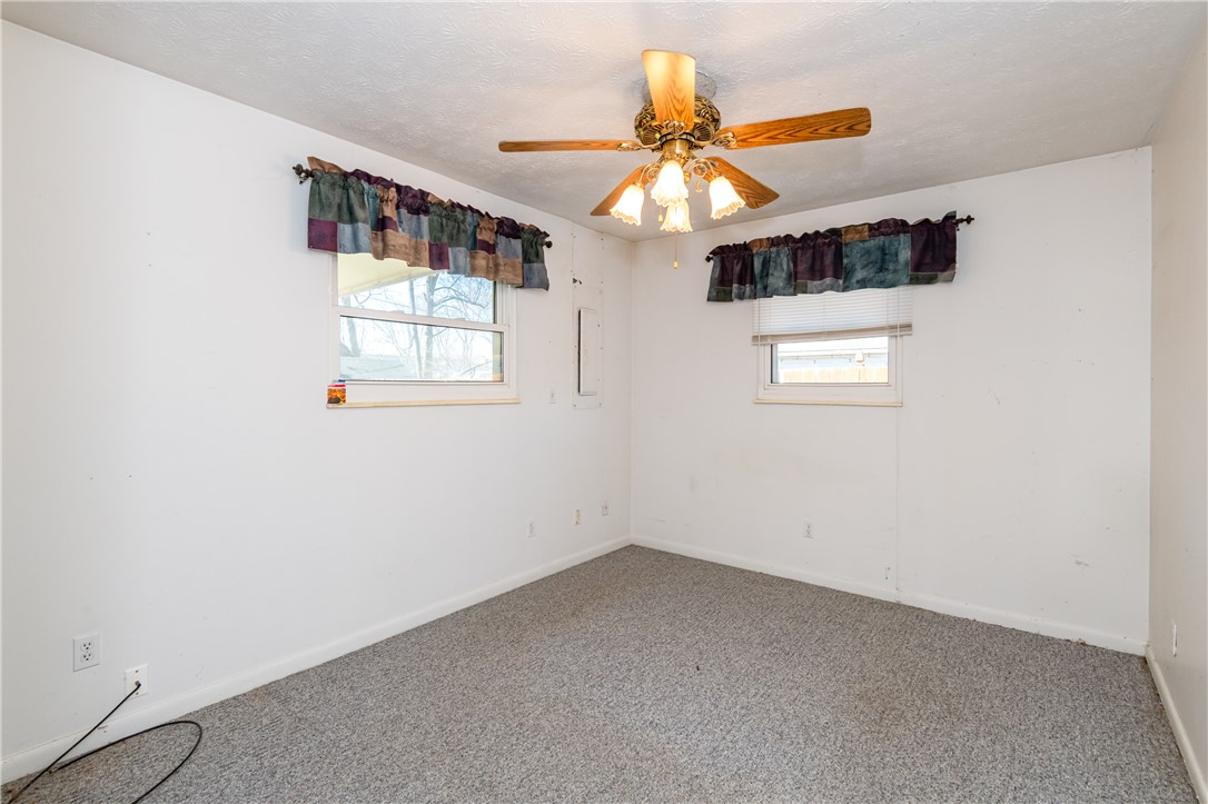 5760 Kitridge Road Dayton, OH 45424 - Photo 9 of 19 This spacious room features ample natural light and a practical layout.