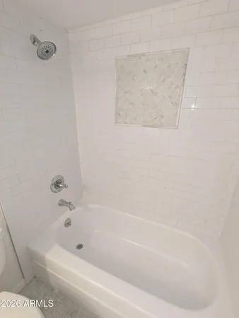 a bathroom with a bathtub
