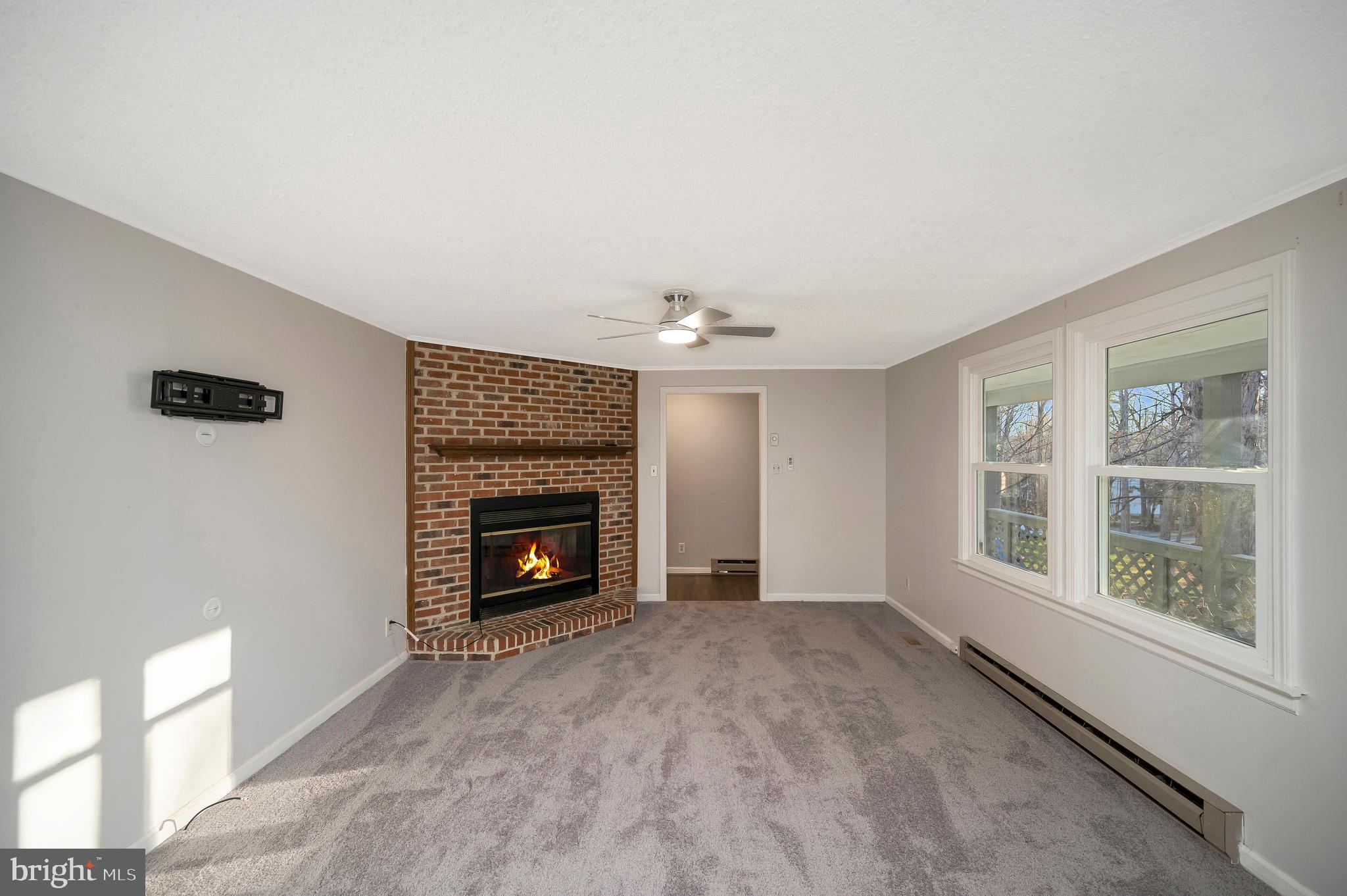 12402 Toll House Road Spotsylvania, VA 22551 - Photo 12 of 59 a view of an empty room with a window