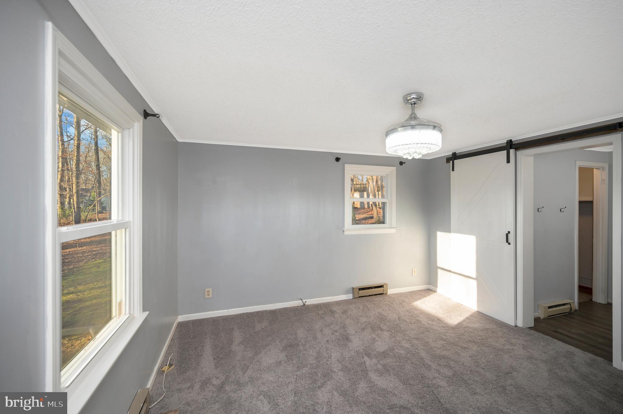 12402 Toll House Road Spotsylvania, VA 22551 - Photo 27 of 59 a view of an empty room with a window