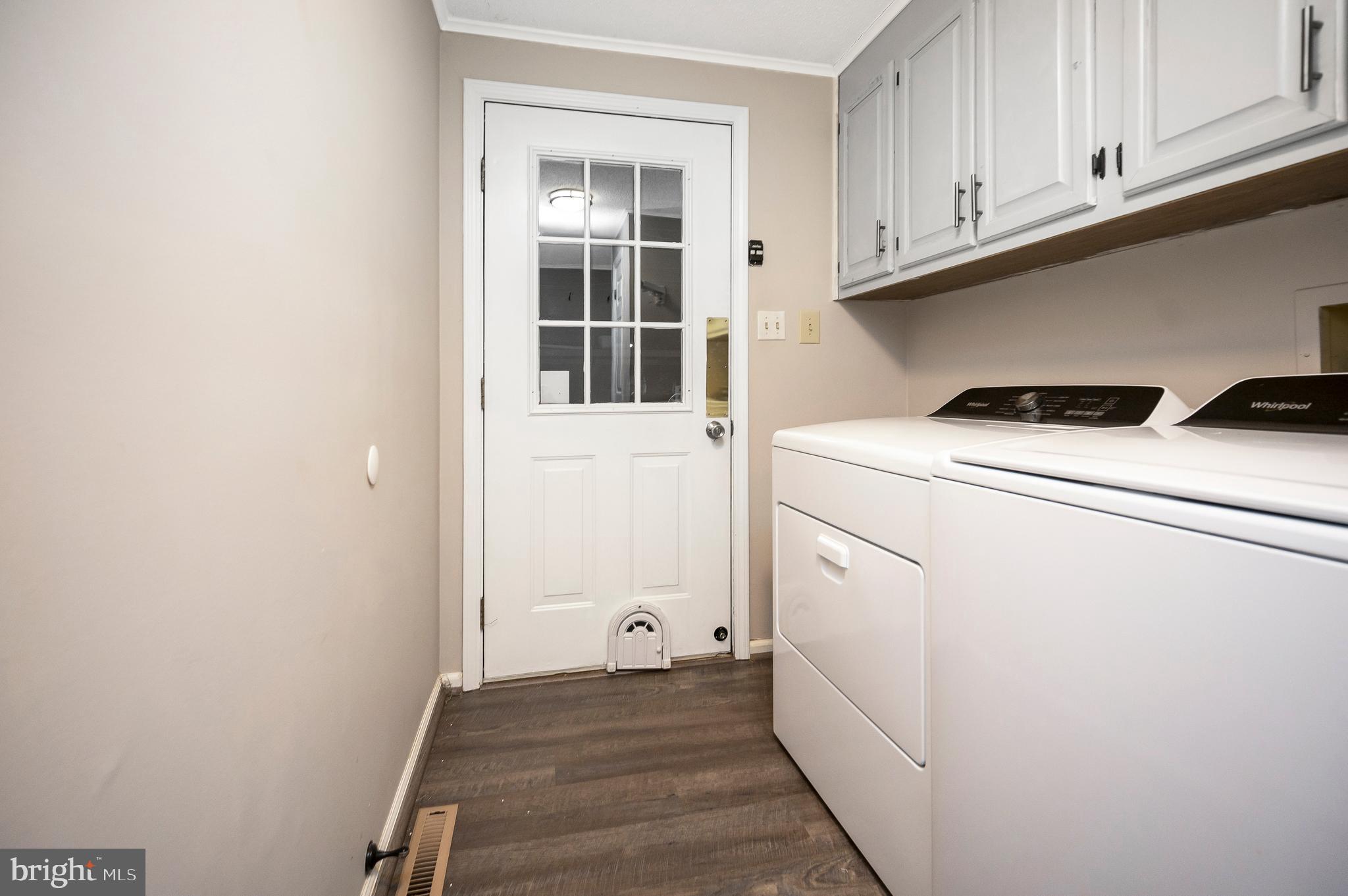 12402 Toll House Road Spotsylvania, VA 22551 - Photo 35 of 59 a utility room with dryer and washer