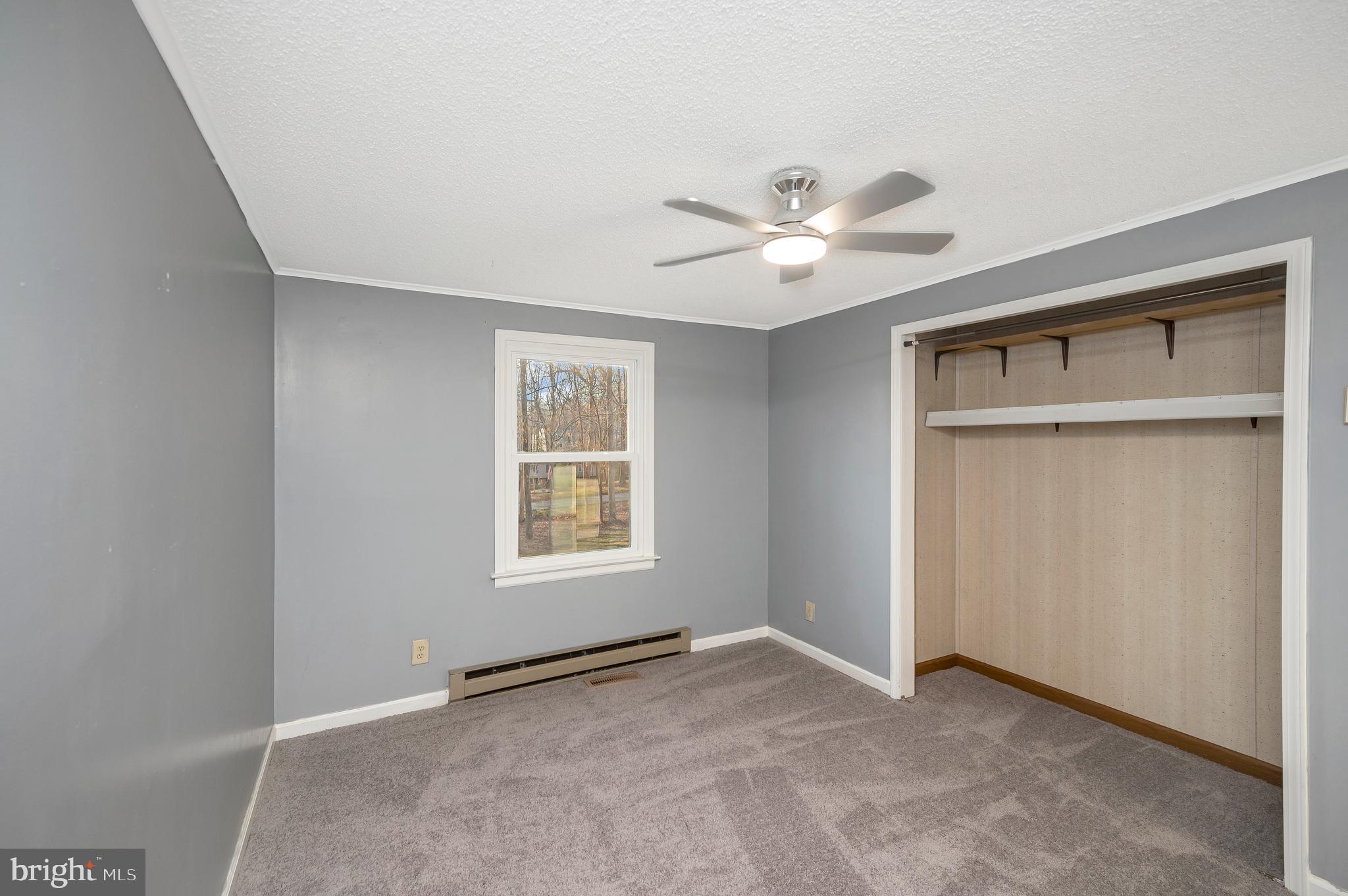 12402 Toll House Road Spotsylvania, VA 22551 - Photo 37 of 59 a view of an empty room with a window