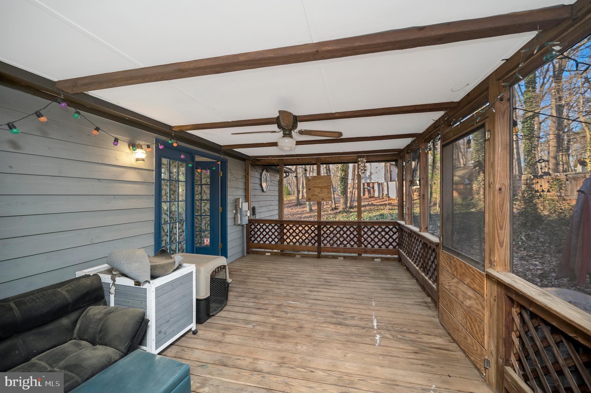 12402 Toll House Road Spotsylvania, VA 22551 - Photo 44 of 59 a view of a porch with furniture