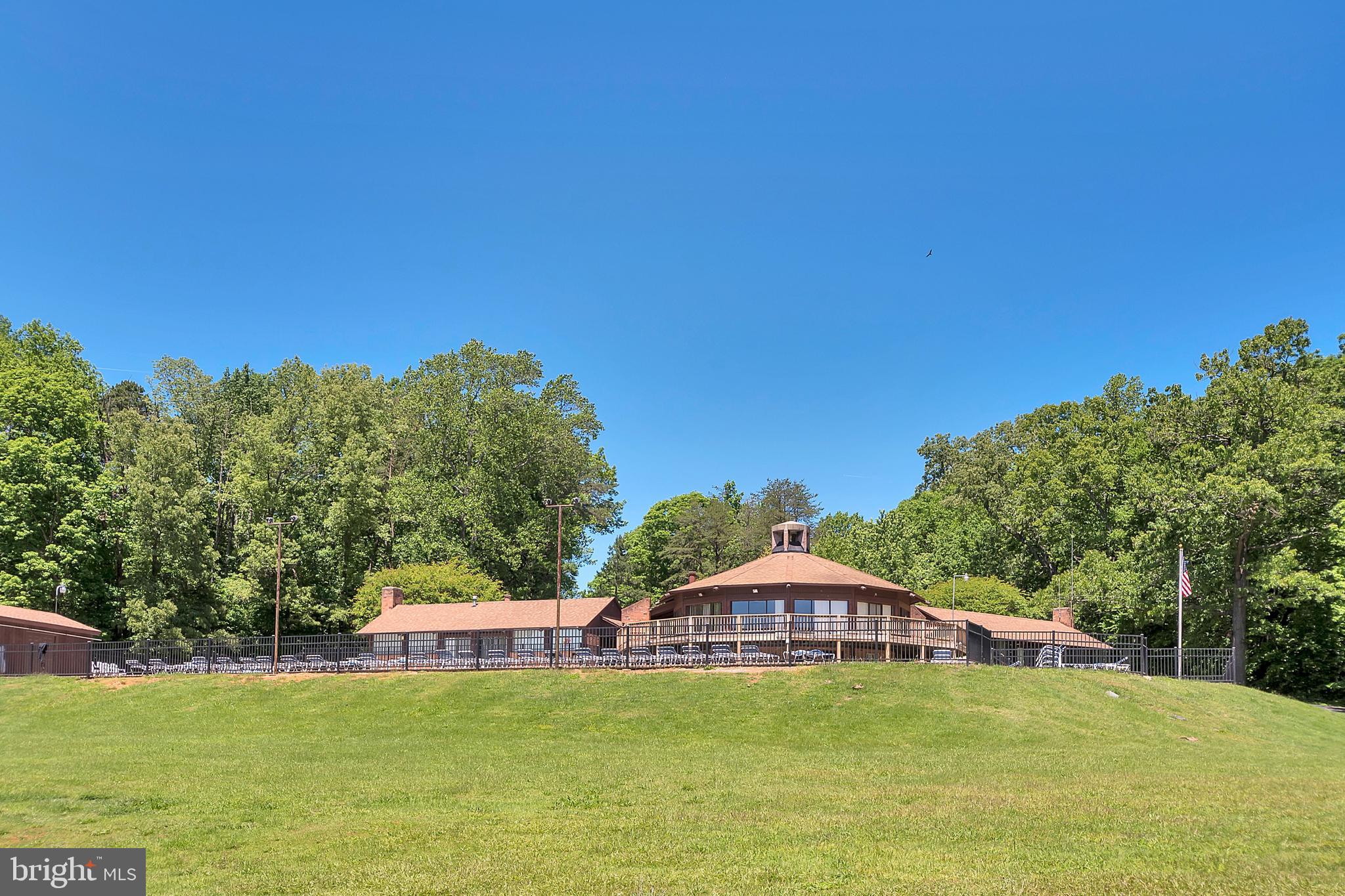 12402 Toll House Road Spotsylvania, VA 22551 - Photo 46 of 59 a swimming pool with outdoor seating and yard