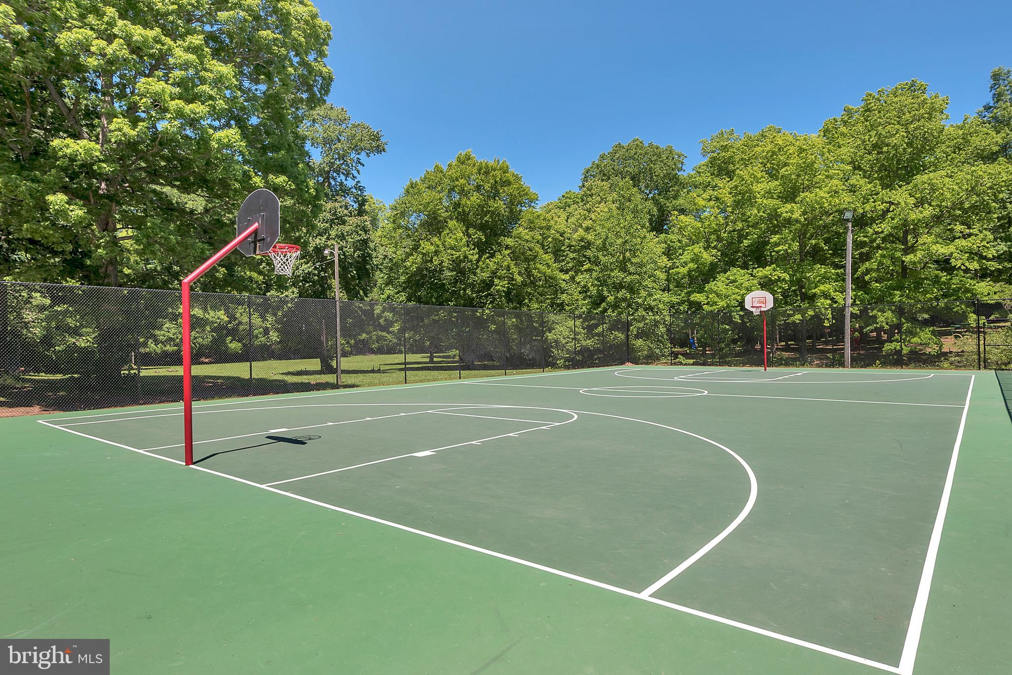 12402 Toll House Road Spotsylvania, VA 22551 - Photo 48 of 59 a view of a tennis court