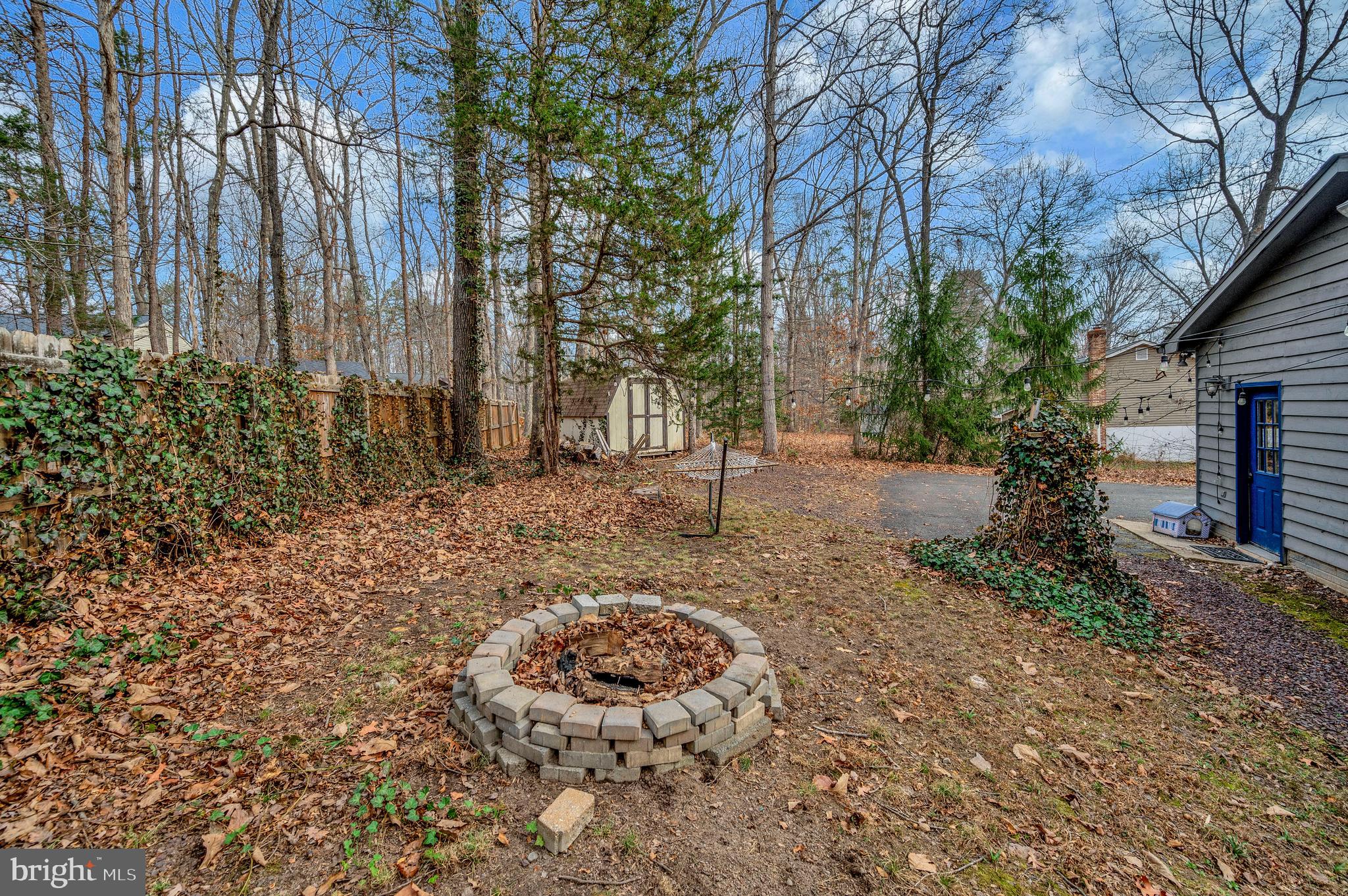 12402 Toll House Road Spotsylvania, VA 22551 - Photo 56 of 59 a view of a backyard with large trees